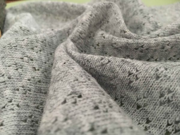 grey perforated jacquard fabric