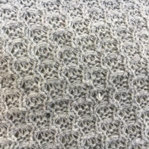 Uniqeu shape grey knitted fabric in Kamer Fabric