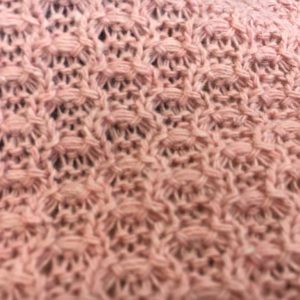 Uniqeu shape pink knitted fabric in Kamer Fabric