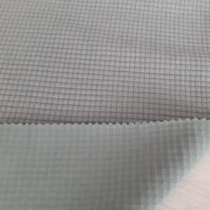 White jacquard interlock fabric in Kamer Fabric