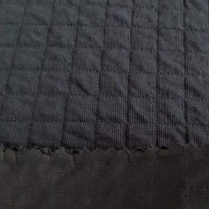 Black plaid jacquard interlock fabric in Kamer Fabric