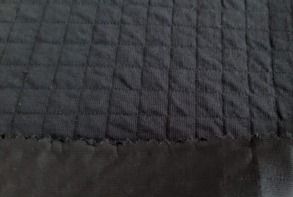 Black plaid jacquard interlock fabric in Kamer Fabric