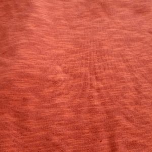 Melange orange knitting fabric in Kamer Fabric